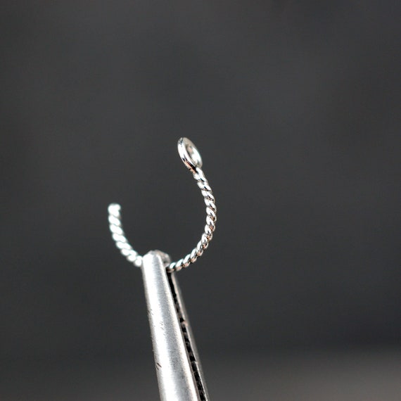 Sterling silver nose shop ring turning black