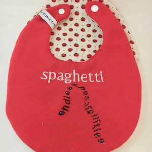 SPAGHETTI endless possibilities baby bib; embroidered, reversible, handmade