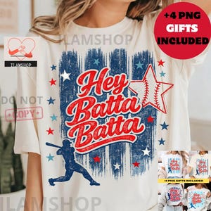 May include: Cream-colored t-shirt with a baseball-themed design. The graphic features the text "Hey Batta Batta" in red, a baseball star, and a blue silhouette of a baseball player. Includes "+4 PNG GIFTS INCLUDED".