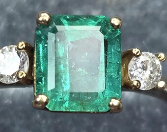 Vintage natural emerald and diamond ring