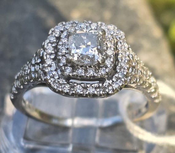 Diamond solitaire with halos - image 1