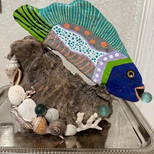 driftwood fish and shell sculpture