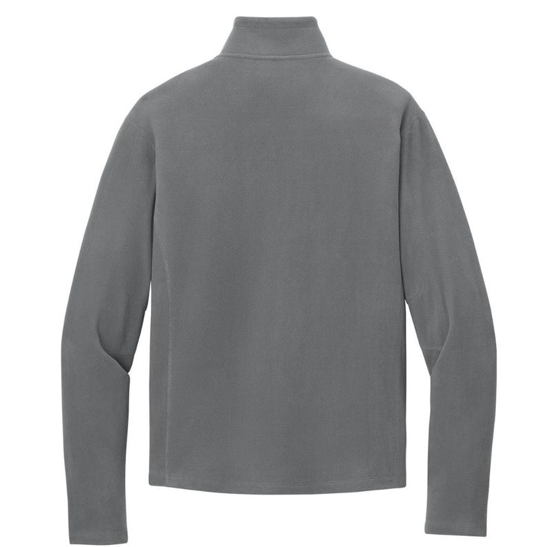 May include: A gray fleece pullover with a mock neck collar and long sleeves. The back view of the garment shows a smooth, solid color and a simple, classic design. The fleece material appears soft and comfortable.