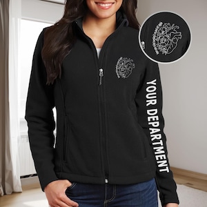 May include: Black fleece jacket with a white heart design and the text "YOUR DEPARTMENT" on the sleeve.