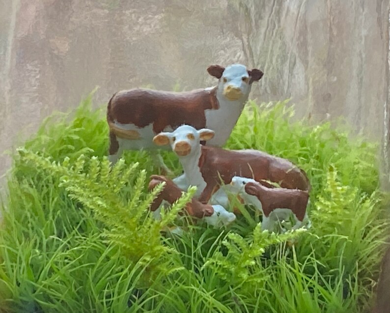 Moss Terrarium wee cow family image 1