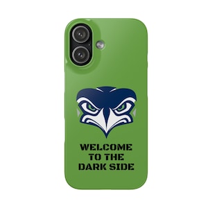 May include: Green phone case featuring a navy and white stylized bird logo with green eyes. Below the logo, the text reads "WELCOME TO THE DARK SIDE" in black. The phone case has a dual-lens camera.