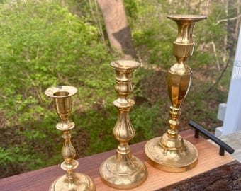 Bundle-Three brass candlestick holders in 3 graduated heights. Vintage.