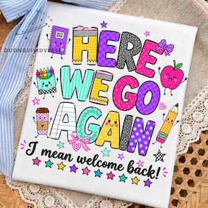 May include: A white graphic print featuring the colorful text "HERE WE GO AGAIN I mean welcome back!" surrounded by illustrations of a purple notebook, a box of crayons, a coffee cup, a red apple, and a yellow pencil, accented with small stars.