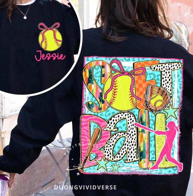 May include: Black sweatshirt with a colourful graphic design featuring the word "Softball" with a softball, bat, and a player. The design includes a variety of patterns, including leopard print, polka dots, and stripes. The text "Jessie" is on the front of the sweatshirt.
