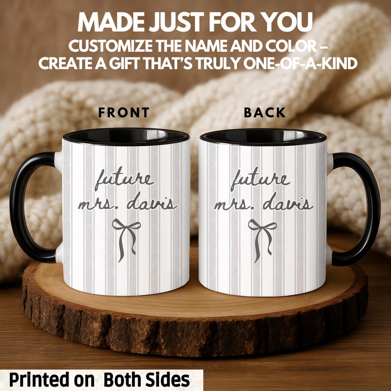 Future Mrs. mug with customizable name printed on both sides, featuring grey script text and a dainty bow on a white striped background. Black-handle ceramic mug displayed in cozy setting. Personalized engagement mug for bride-to-be, perfect bridal shower or proposal gift. Custom name and color options available.