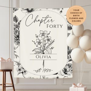 May include: A personalized cream-colored banner with black floral accents and the text "Chapter FORTY" above a floral illustration and the name "OLIVIA". The banner also includes the text "-est 1985-". A round sticker reads "YOUR CHOICE OF BIRTH FLOWER AND COLORS".