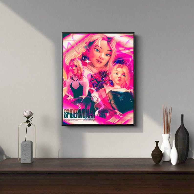 May include: A digital art print featuring three women in superhero costumes with pink and purple backgrounds. The text "SPIDERWOMAN" is at the bottom of the print.