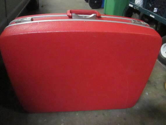 red vintage suitcase