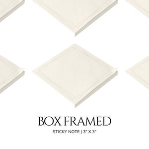 May include: A set of four off-white sticky notes with a gold-colored border. The notes are arranged in a diamond pattern. The text "BOX FRAMED STICKY NOTE | 3" X 3" " is printed below the notes.