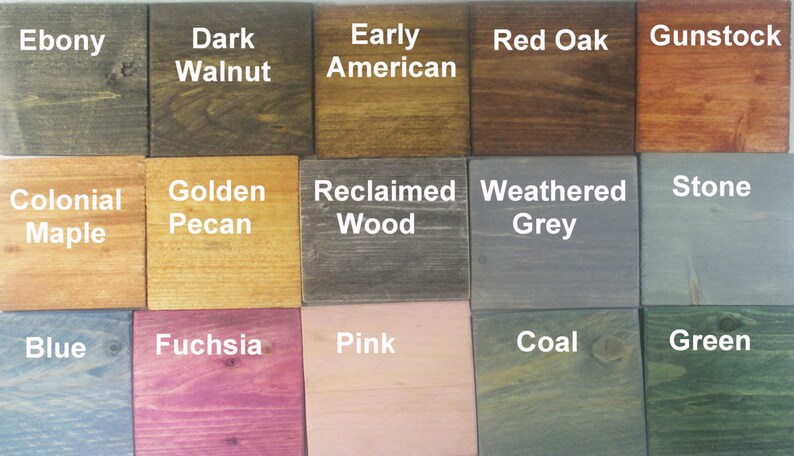 May include: A wood stain color chart with 15 different wood stain colors. The colors are arranged in three rows of five. The colors are: Ebony, Dark Walnut, Early American, Red Oak, Gunstock, Colonial Maple, Golden Pecan, Reclaimed Wood, Weathered Grey, Stone, Blue, Fuchsia, Pink, Coal, and Green.