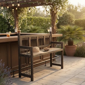 May include: Outdoor bar and seating area with a wooden bench, a bar, and a fire pit. The bar has drinks and bottles on it. A straw hat and a bowl of snacks sit on the bench. The area is surrounded by plants and flowers.