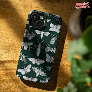 May include: A green phone case featuring a white pattern of butterflies, moths, and beetles. The case has a camera lens cutout and a white border.
