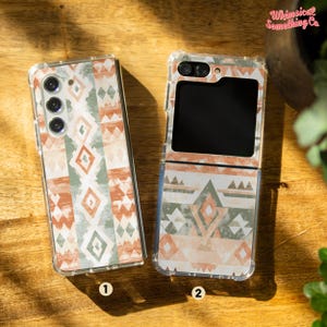 May include: Two clear phone cases with a geometric pattern in shades of peach, green, and white. The case on the left is for a standard phone, while the case on the right is for a foldable phone.