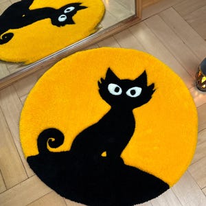 Handgemaakt getuft geel vloerkleed 'zwarte kat op gele achtergrond'