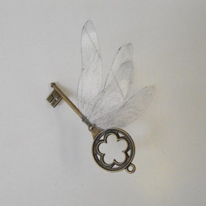 Magical flying winged key with dragonfly wings in antique brass - ARBDF
