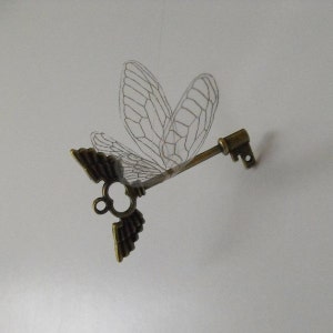 Flying winged key with large wings in antique brass - ASWLP