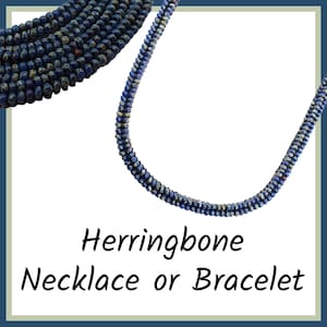 May include: A blue and white herringbone necklace or bracelet made with small beads.