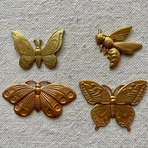 Set of Four Different Vintage Brass Stampings