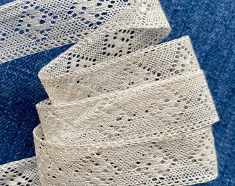 Antique Lace with Good Luck Symbol by the yard