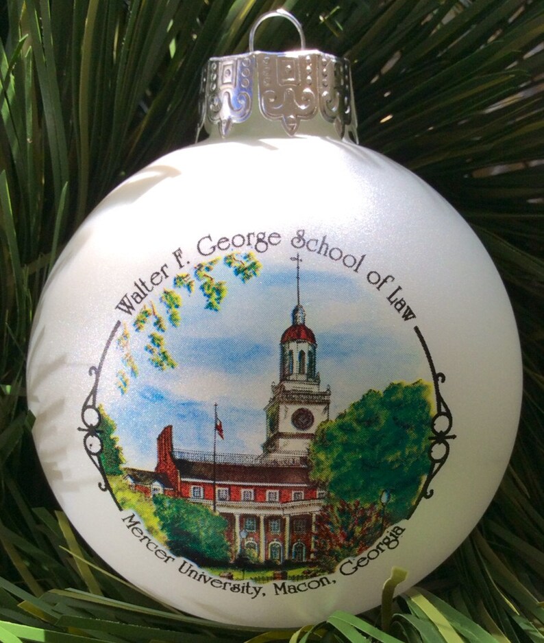 May include: White Christmas bauble featuring a colourful image of the Walter F. George School of Law at Mercer University, Macon, Georgia.