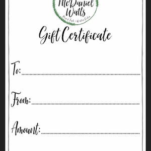 May include: A white gift certificate with a green circle logo that says "Custom Artwork Dale McDaniel Watts Pen & Ink - Water Colours" and the text "Gift Certificate". The certificate has lines for "To:", "From:", "Amount:", and "Date:".
