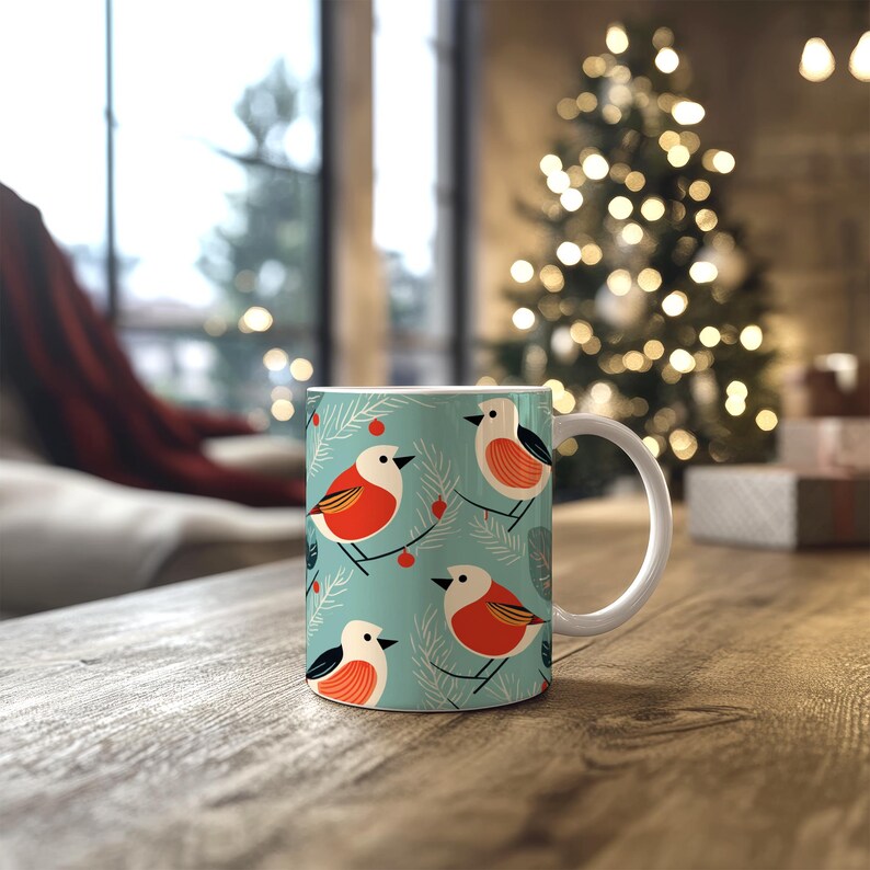 May include: White ceramic mug with a blue background and a repeating pattern of red and white birds, green branches, and red berries.