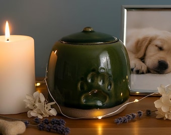 Pet cremation urn, ceramic paw memorial vessel, dog cat ashes holder