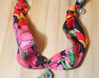 Handmade soft cotton, floral scarf necklace with blue, pink and green charm and intricate details.