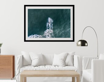 Framed Ocean Photography of a Surfer Paddling Out by Lance Asper