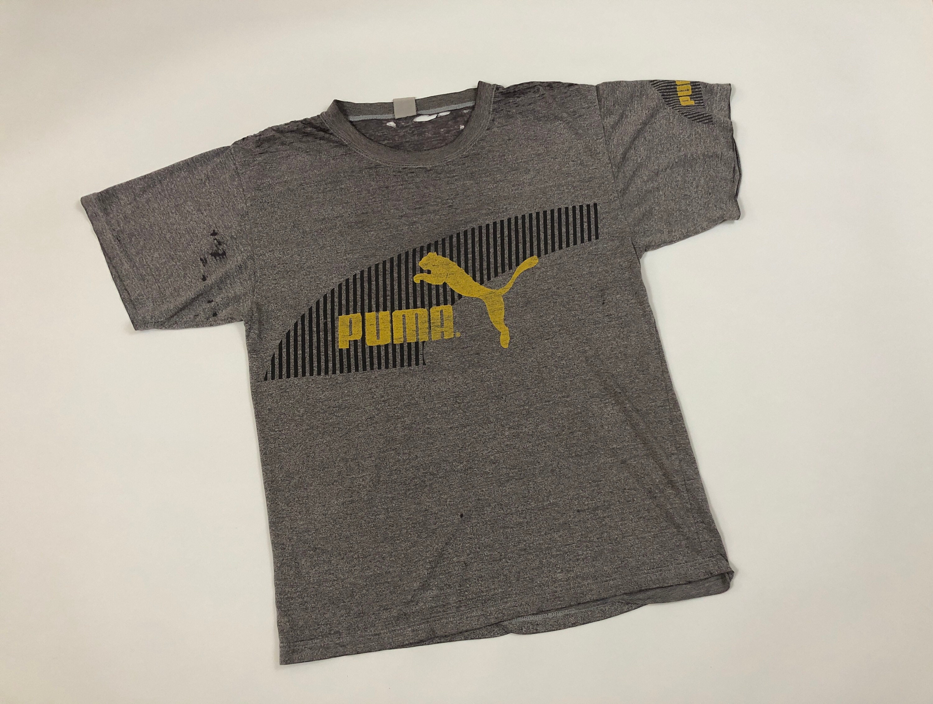 Magliette vintage puma on sale