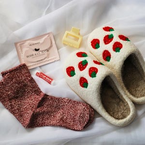 Conjunto de presente de chinelo aconchegante