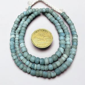 Aqua Java Glasperlen: Indonesische Gestreifte Spacer Perlen