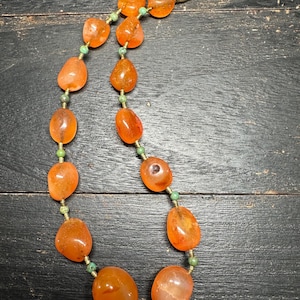 Handmade Carnelian Bead Necklace from Nepal – Natural Orange Gemstone with Brass Accents – Tribal Ethnic Jewelry