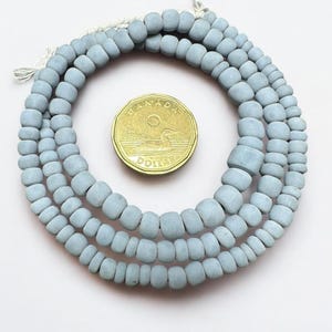 One strand Light Blue Java Glass Beads: Indonesian Striped Spacer Beads