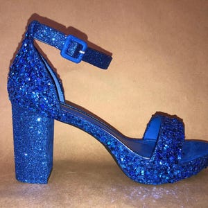 Something blue wedding shoes for the bride or bridesmaids.  Any color/style. Blue heels