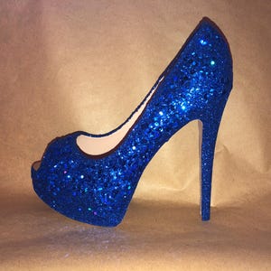 Something blue wedding shoes for the bride or bridesmaids.  Any color/style. Blue heels