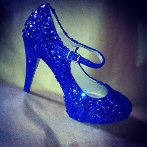 Something blue wedding shoes for the bride or bridesmaids.  Any color/style. Blue heels