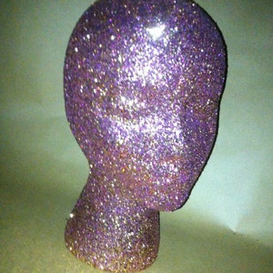 Glitter and Sparkle wig head for decorative purposes, holding wigs, or salon decorations.  Any color you&#39;d like.