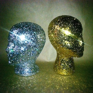 Glitter and Sparkle wig head for decorative purposes, holding wigs, or salon decorations.  Any color you&#39;d like.