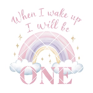 Peut inclure: Un arc-en-ciel rose et violet avec des étoiles dorées et des nuages blancs. Le texte "When I wake up I will be ONE" est écrit en rose.