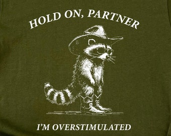 Overstimulated Raccoon Cowboy T-Shirt: Funny Mental Health Tee