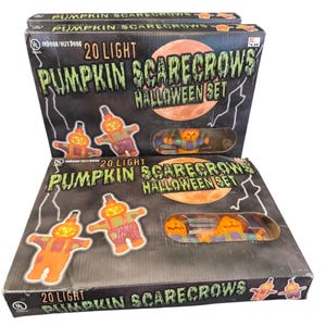 May include: Two boxes of Halloween decorations. Each box features a pumpkin scarecrow design with the text "Pumpkin Scarecrows Halloween Set". The boxes contain 20 lights and are suitable for indoor or outdoor use.