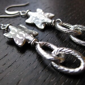 Textured silver earrings image 1