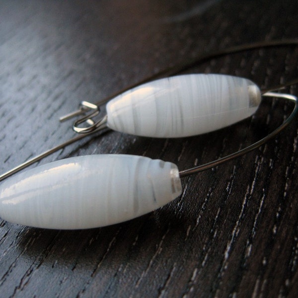 Sleek white and clear glass earrings