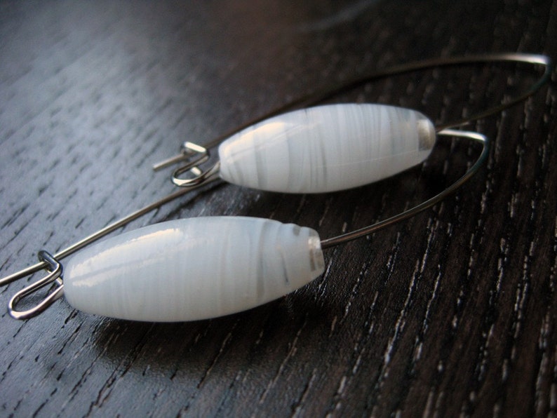 Sleek white and clear glass earrings image 1
